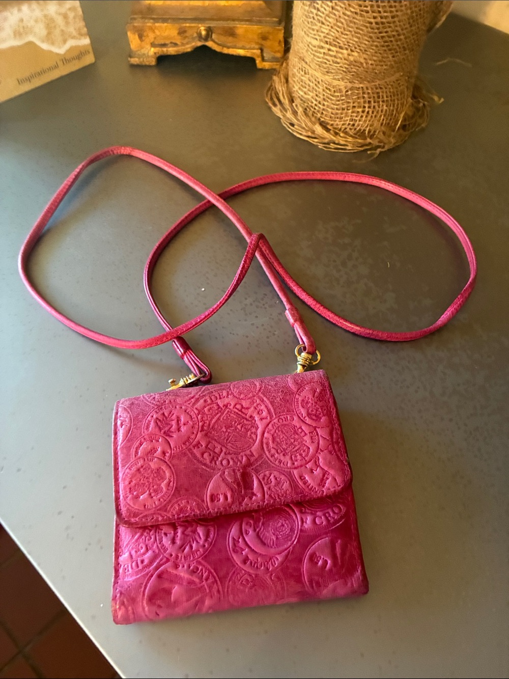 Wilson’s Leather crossbody, small, PINK, snaps closed.